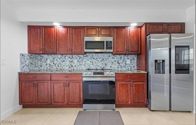 Discover your dream retreat in beautiful SE Cape Coral! This - photo 8