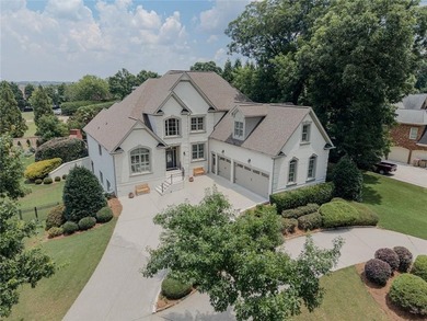 Nestled on a private cul-de-sac within the prestigious gates of - photo 3