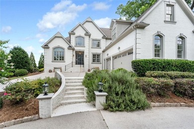 Nestled on a private cul-de-sac within the prestigious gates of - photo 6