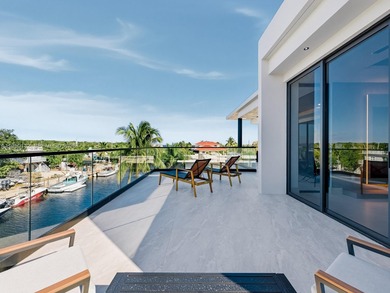 Waterfront luxury in the heart of Key Largo, Florida. This newly