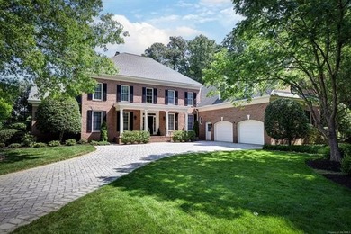 This all-brick colonial sits on a private end lot and offers a - photo 1