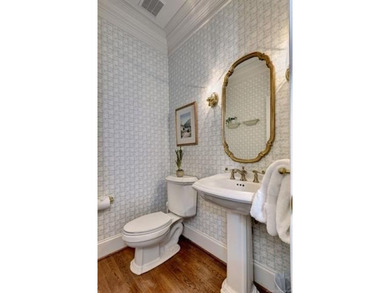 This all-brick colonial sits on a private end lot and offers a - photo 5