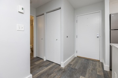 Tastefully remodeled first floor unit with a unique