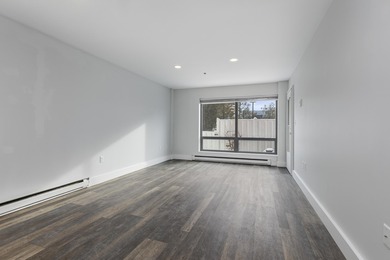 Tastefully remodeled first floor unit with a unique