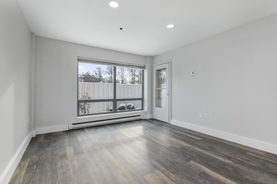 Tastefully remodeled first floor unit with a unique