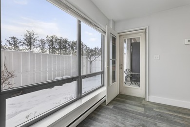 Tastefully remodeled first floor unit with a unique