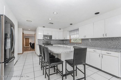 This Stunning 2-Family Contemporary Home Nestled in the - photo 6