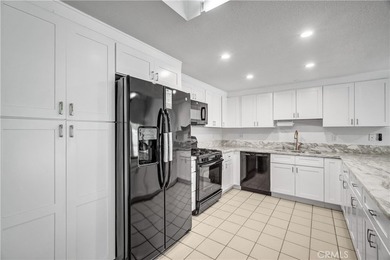 Welcome to this beautifully upgraded one-story condo in a gated - photo 25