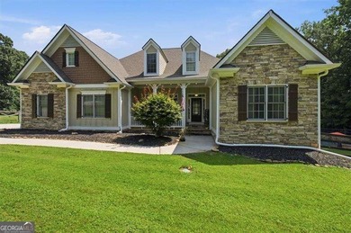 Minutes from Lake Allatoona, tucked on 3.42 private acres, this - photo 1