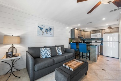 Welcome to Grand Caribbean West Unit 214, a turnkey, fully - photo 3
