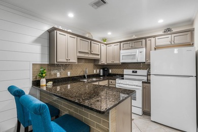 Welcome to Grand Caribbean West Unit 214, a turnkey, fully - photo 10