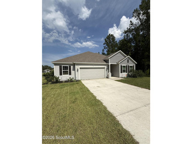 Welcome to effortless coastal living in the sought-after gated