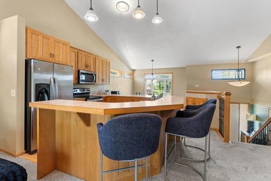 Bright, open, and overlooking the pond, this home offers a - photo 8