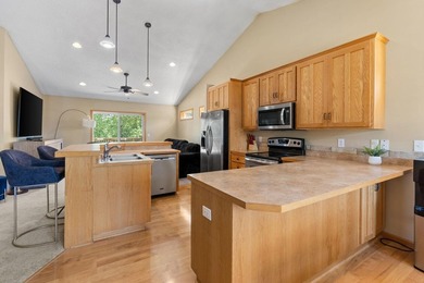 Bright, open, and overlooking the pond, this home offers a - photo 9
