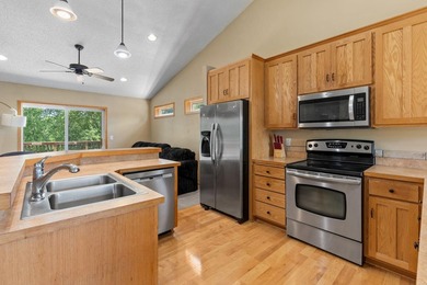 Bright, open, and overlooking the pond, this home offers a - photo 10
