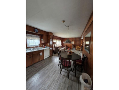 Spacious 3-bedroom, 1.5-bath mobile home filled with charm - photo 8