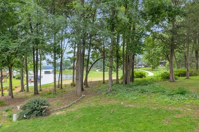 Set on a quiet, non-through street behind the 13th green, this - photo 30