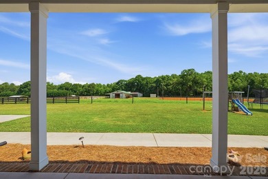 Just beyond a gated entrance and surrounded by beautifully - photo 6