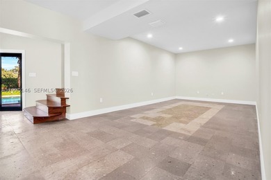 Located on a private gated island in Miami Beach, this residence - photo 24