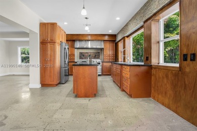 Located on a private gated island in Miami Beach, this residence - photo 33