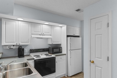 Tucked away in the highly sought-after Spinnaker Cove community