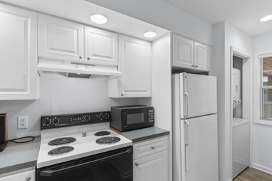 Tucked away in the highly sought-after Spinnaker Cove community