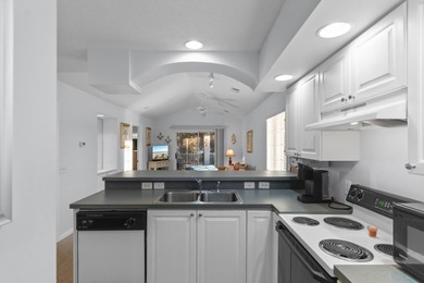 Tucked away in the highly sought-after Spinnaker Cove community