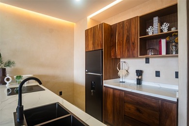 Discover this stunning penthouse residence at ALUX 33, a - photo 5