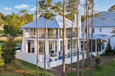 Located in the prestigious gated waterfront community of - photo 1