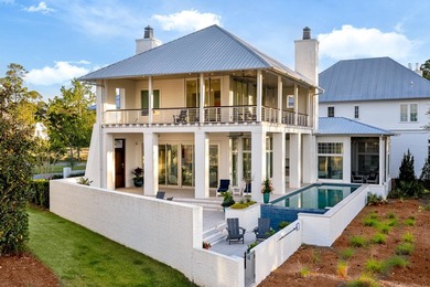 Located in the prestigious gated waterfront community of - photo 6