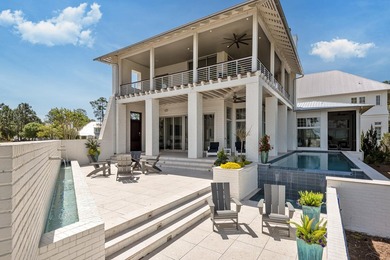 Located in the prestigious gated waterfront community of - photo 7