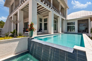 Located in the prestigious gated waterfront community of - photo 9