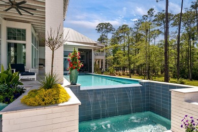 Located in the prestigious gated waterfront community of - photo 10
