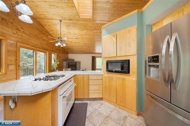 Nestled on 28 private acres with 805 feet of lake frontage and - photo 17