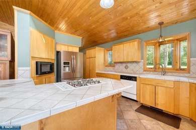 Nestled on 28 private acres with 805 feet of lake frontage and - photo 18