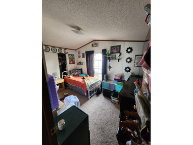 Peaceful country living awaits on this 3.4 acre wooded property