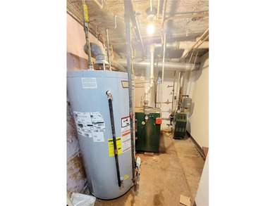 Welcome to this Extra Large 2 family brick house! Situated in - photo 9