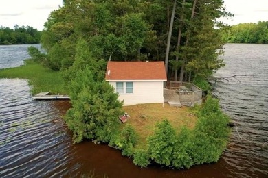 Now is your chance to own an ISLAND! This unique property was - photo 6