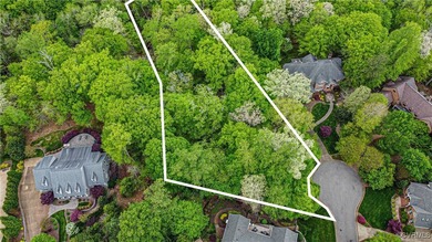 This 1-acre lot is located in the exclusive Holly Hills - photo 1