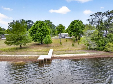Charming 2-bedroom, 2-bath lakefront home with detached - photo 2