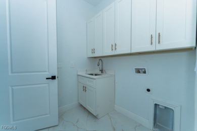 Stunning New construction home on Freshwater canal. This - photo 9