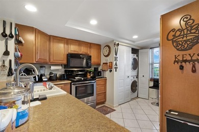 Beautifully updated top floor condo in the 55+ community of Palm