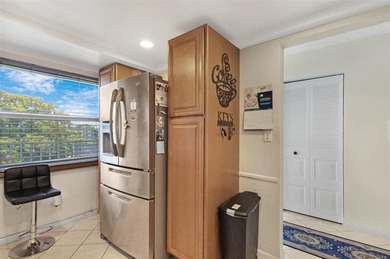 Beautifully updated top floor condo in the 55+ community of Palm