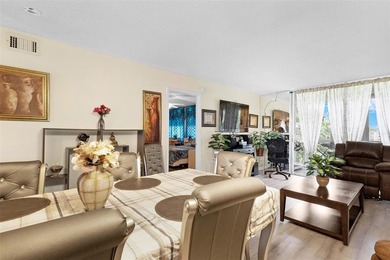 Beautifully updated top floor condo in the 55+ community of Palm