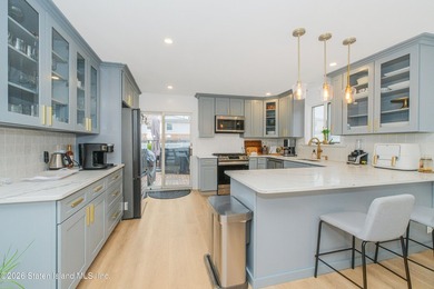 Welcome to 287 Abingdon Ave, a fully renovated three-bedroom - photo 9