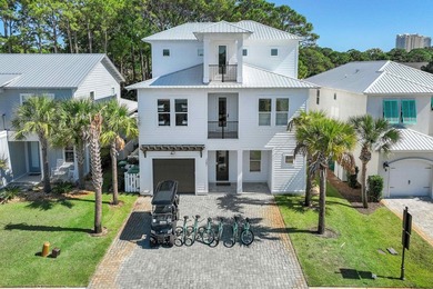 Welcome to the exceptional coastal retreat located in the highly - photo 2