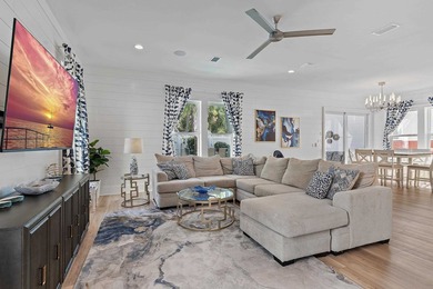 Welcome to the exceptional coastal retreat located in the highly - photo 3