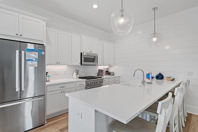 Welcome to the exceptional coastal retreat located in the highly - photo 9
