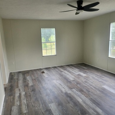 Welcome to this 1,900-square-foot mobile home situated on 5 - photo 11