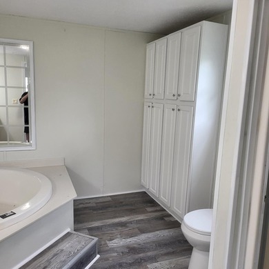 Welcome to this 1,900-square-foot mobile home situated on 5 - photo 15